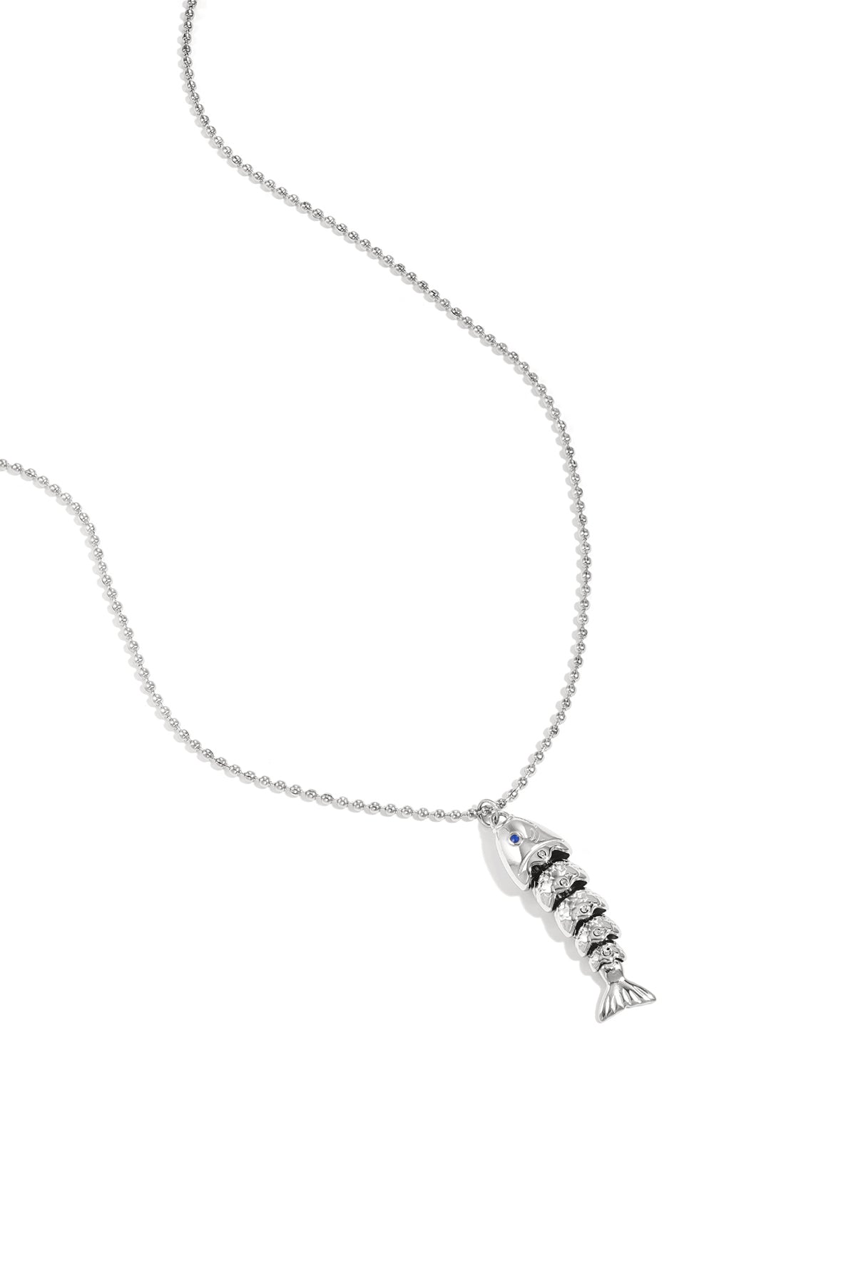 Necklace with moving fish charm